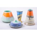 A collection of Shelley 'Harmony' wares, including tapering conical vases in dripped orange glazes,