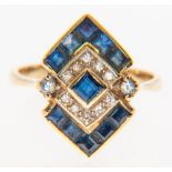A sapphire and diamond Art Deco style ring, a central square cut sapphire having diamonds (5),