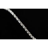 A diamond Tennis bracelet, diamonds (50) brilliant cut stone, claw set in 18 carat white gold.