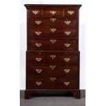 A George III mahogany chest on chest, dentil and cavetto moulded cornice,