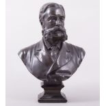 Thomas Brock a bronze portrait bust of a Victorian Gentleman, square section socle, 21cm.