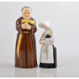 Royal Worcester candle snuffer, modelled as a Monk, height 13cm and another of a Nun, (2).