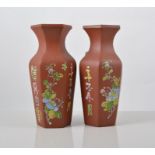 Pair of Chinese Red ware vases, of hexagonal section, enamelled decoration of birds,