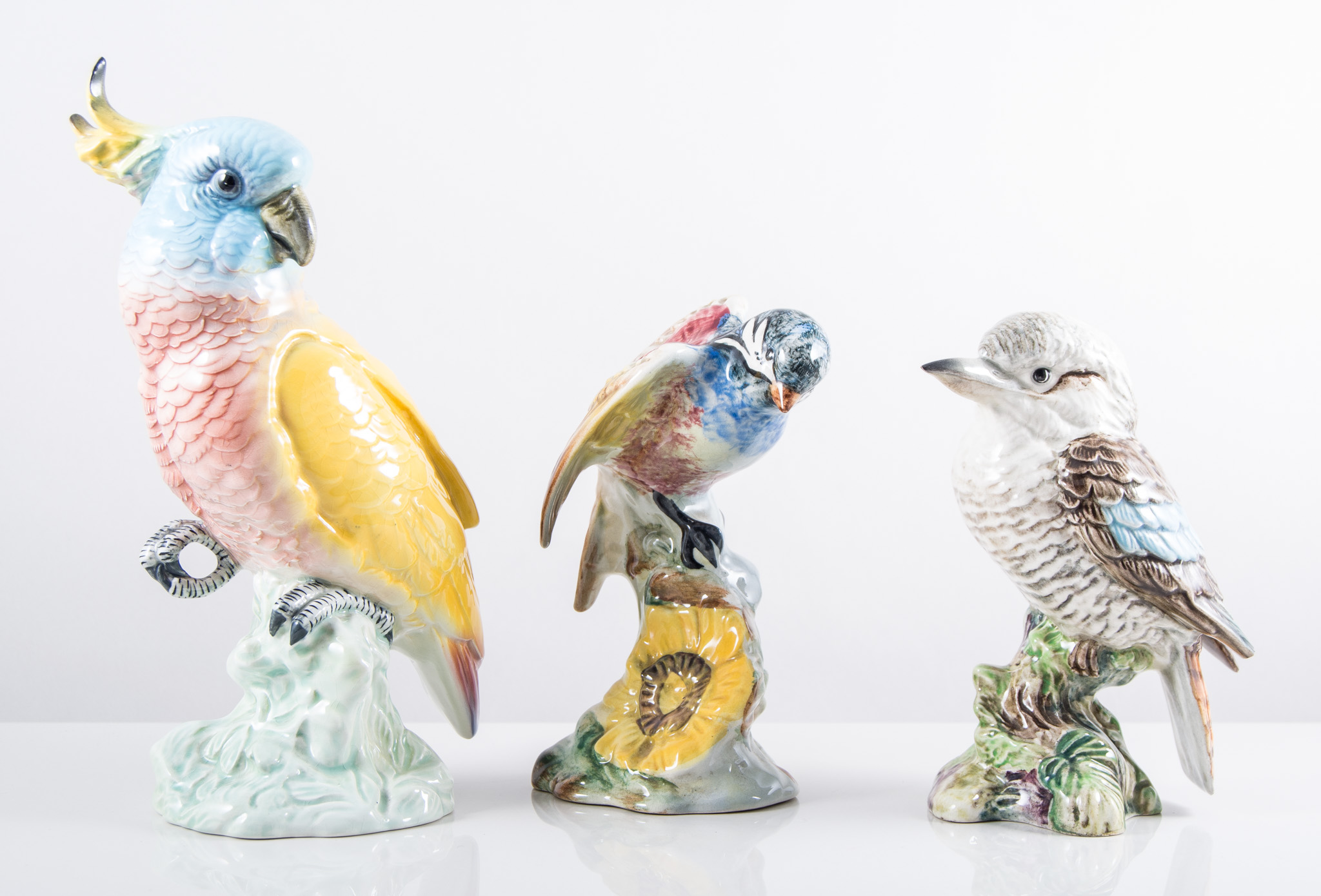 Beswick model of a Cockatoo, No. 1180, 21cm and three others, Kookaburra No. 1159, Parakeet No.