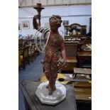 20th Century gilt and red painted standing figure,
