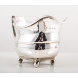 George III silver cream jug, rectangular form on four ball feet, London 1809, approximate weight 4.