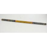 A Victorian painted wood truncheon, decorated with a crown and VR, length 66cms.