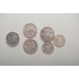 Four Southern Rhodesia two shilling coins, 1935, 1936 x 2, 1942,