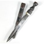 Scottish Military Dirk, the pommel with metal cap and Crown, leather bound studded grip,