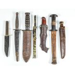 A Bowie knife by Jameson, Sheffield, a commando dagger, a sheath knife, an American bayonet,