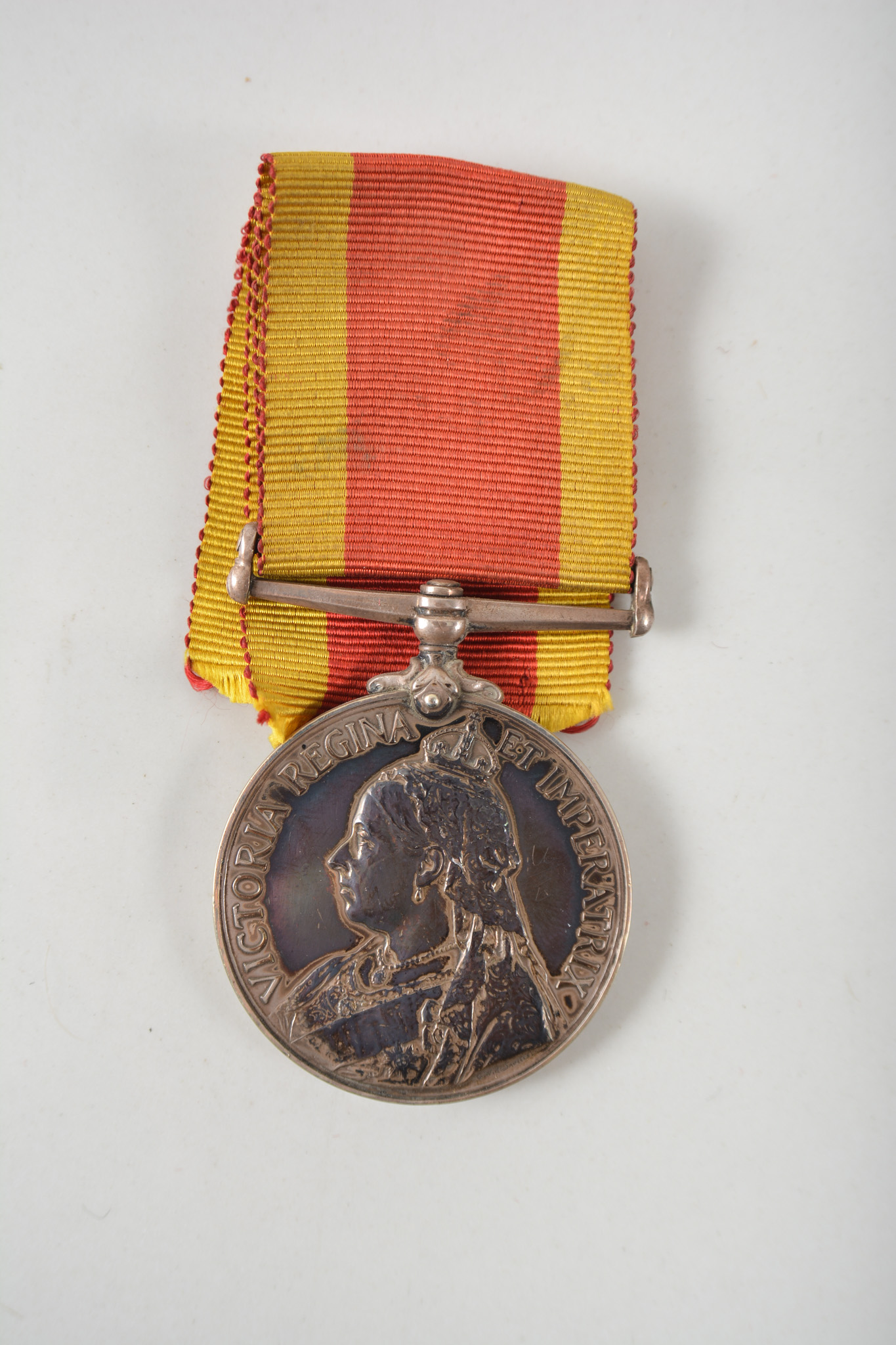 W. G. McKinlay, P. O. 2 CL, HMS Terrible, a China War medal 1900, silver with ribbon.