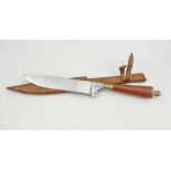 A bowie knife, 18cm blade, stained wood and brass handle, with leather sheath.