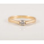 A diamond solitaire ring,