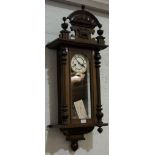 Mahogany cased twin train mantle clock with Roman numeral chapter ring "GB" on dial,