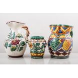 Collection of Italian pottery jugs, vases and dishes, each piece with lead-glazed decoration,