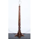 Mahogany standard lamp with carved column of entwined leaves, hobnail base,