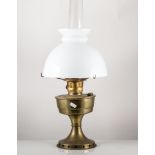 Brass oil lamp, complete with opaque shade and chimney, 62cms overall.