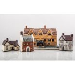 Collection of pottery cottage models, including "The Hind Hotel, Wellingborough", 18cms.