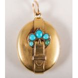 Edwardian yellow metal oval locket, 30mm x 22mm, buckle design to front set with turquoise (5),