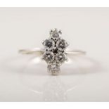 A diamond set cluster ring, diamonds (6), brilliant cut stones,