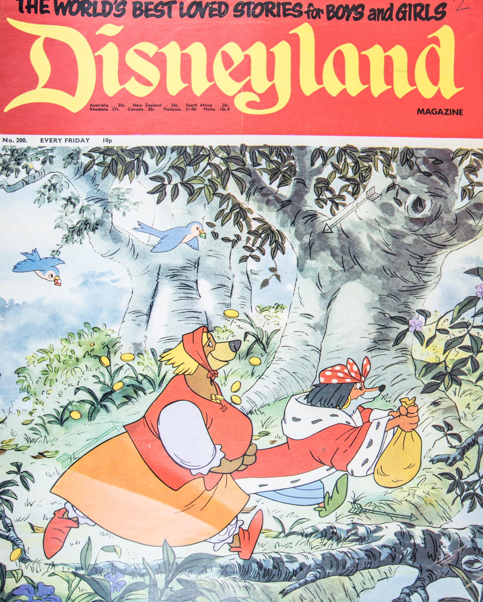 Disneyland comics 1970's, "The Wood Worker" magazine, other magazines, small suitcase of ephemera,