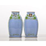 Doulton Lambeth, a pair of Art Nouveau style bud vases, circa 1910,