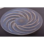 René Lalique, 'Poissons' an opalescent glass plate, designed 1931, engraved and moulded 'R.