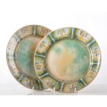 Frank Brangwyn for Royal Doulton, a pair of dinner plates, pattern 5033,