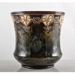 Royal Doulton Lambeth jardiniere, flared form, Art Nouveau style band, on a mottled ground,