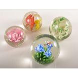 Glass paperweight, designed with a butterfly and flowers,