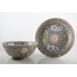 Cantonese shallow dish 24cm, a similar bowl, 20cm, highly decorated in enamels with figures,