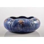 Royal Doulton Lambeth bowl, compressed form with a wavy rim, applied florets and incised leaves,