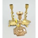 Five various brass candlesticks and chambersticks,
