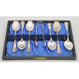 A collection of commemorative spoons and other silver plated cutlery