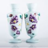 Victorian opaque glass garniture, painted floral decoration, 39cms and smaller and another vase.