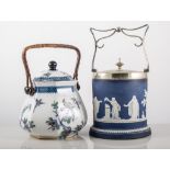 Wedgwood biscuit barrel, another, cottage teapot and sandwich set.