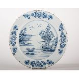 Blue and white Delft charger and two Delft plates, (3).