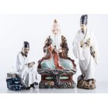 Three modern Chinese glazed figures, height 33cms and smaller, (3).