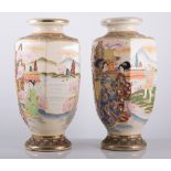 Pair of Japanese Satsuma vases, hexagonal form, painted with figures in a landscape, height 31cm.