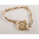 Ladies 9ct hallmarked gold Tudor Royal wristwatch, on an expanding bracelet strap.