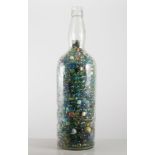 Large bottle of glass marbles.