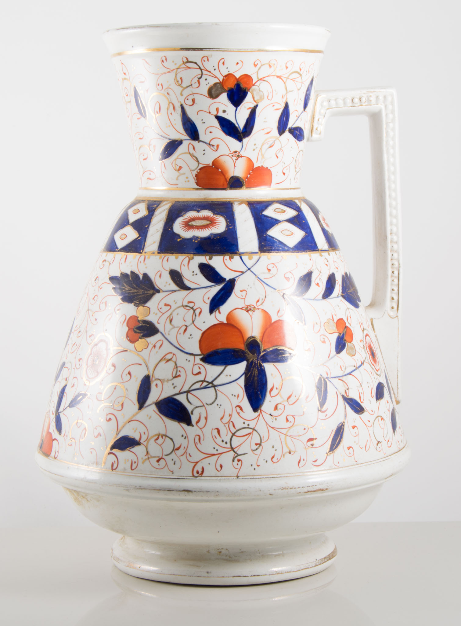 Staffordshire jug and bowl, Imari pattern, together with a matching jug, (3).