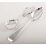 Ornate silver spoon, with fluted bowl and figure of a maiden with basket, London (import mark) 1902,