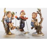 Group of four Hummel figures, including, Boy with Two Piglets,