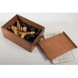 Boxwood and ebony chess set, mahogany case, novelty ships wheel nutcracker with an oak plinth, (2).