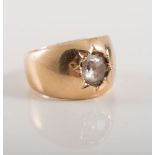Yellow metal signet ring with an old rose cut diamond set into the closed back setting,