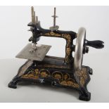 Small German sewing machine.