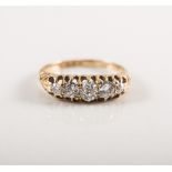 An Edwardian diamond five stone ring, the five old cut stones, graduating in size,