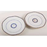 Pair of Chinese export porcelain tea plates, decorated with floral sprigs, diameter 15cms,