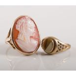 Two dress rings, an oval carved shell cameo 20mm x 15mm,